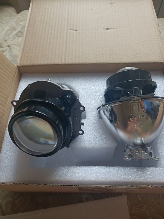 Ксеноновые линзы головного света(ближний свет) Паджеро 4 оригинал