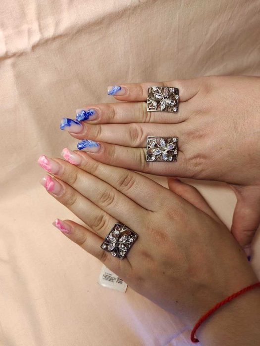 срібний комплект 925проби з фіанітами та золотими вставками.