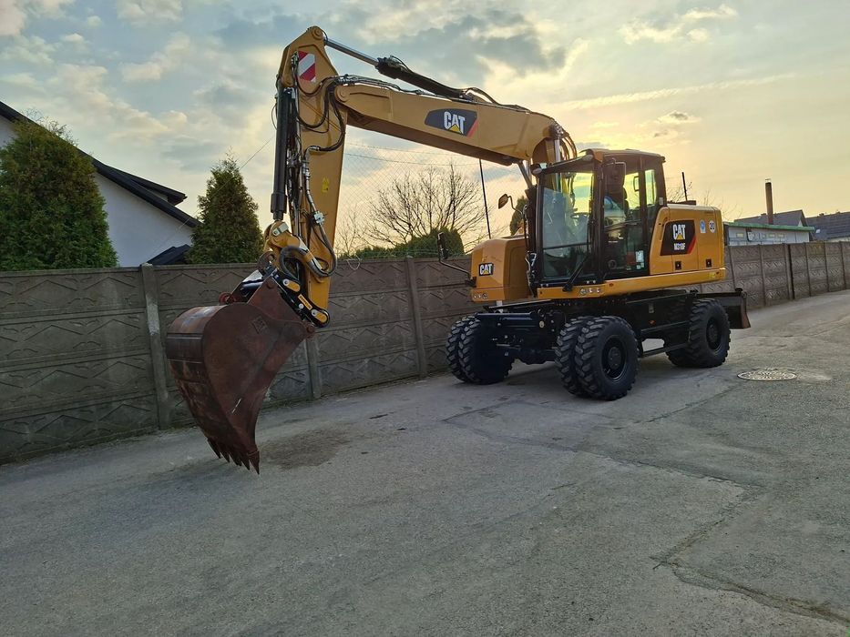 Caterpillar CAT M 318 F  koparka kołowa CAT sprowadzona z Niemiec 316 317 320