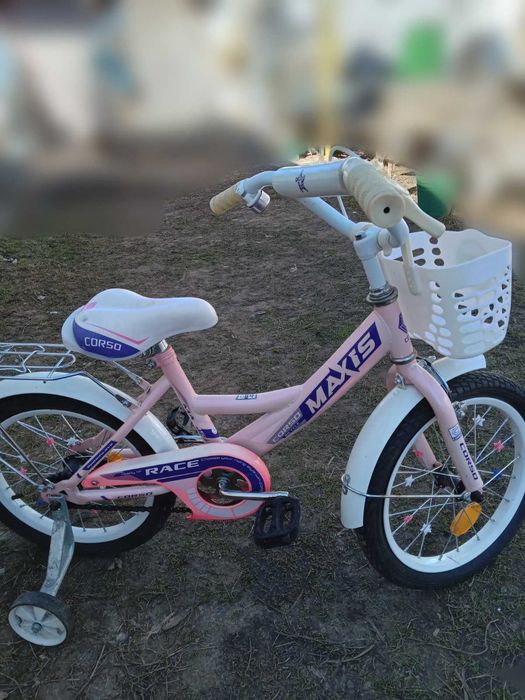 Велосипед для дівчинки на 5-9 років. Дуже зручний додаткові колеса.