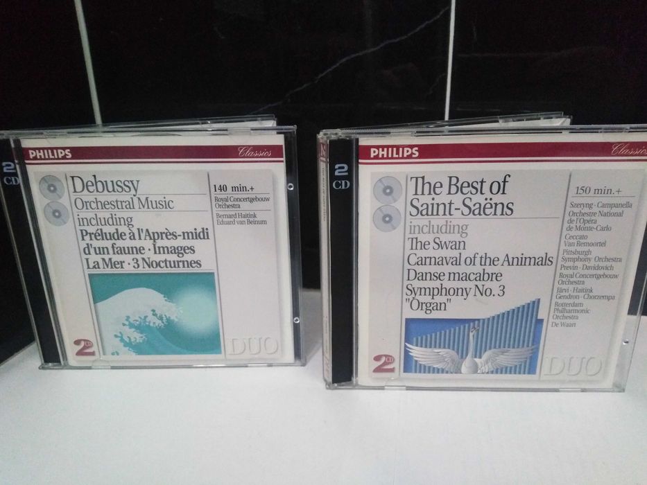 Cds duplos Música Orquestral de Debussy e Cd The Best of Saint-Saëns.