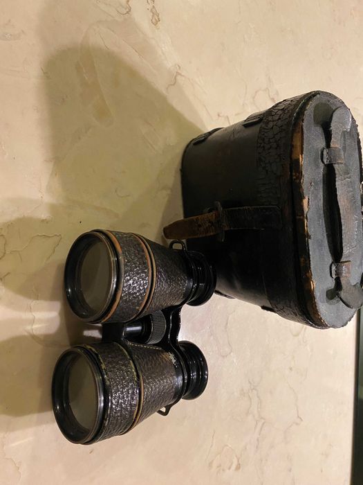 Par de binóculos antigos Greenwich