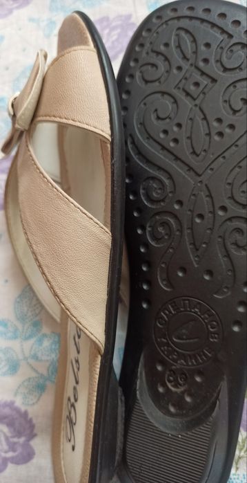 Продам  женские шлëпанцы (босоножки) Belsta