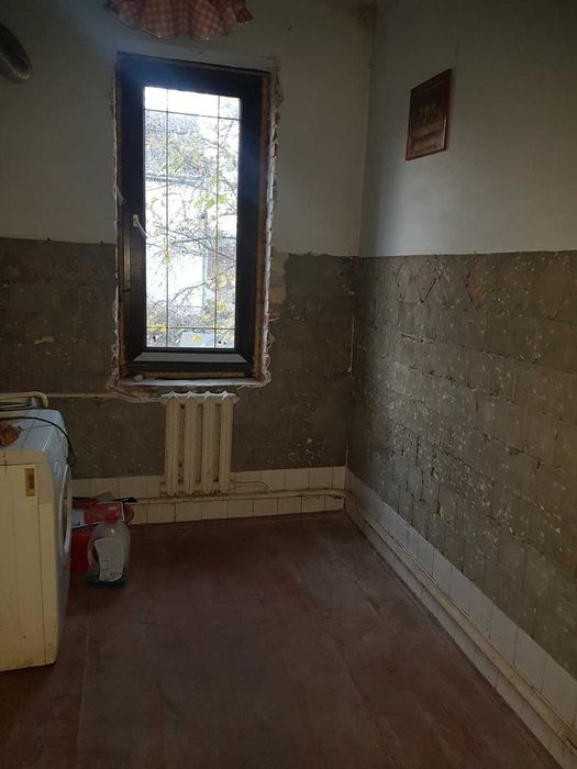 Житловий будинок та земельна ділянка 7,9 сот. м. Кам'янка-Бузька