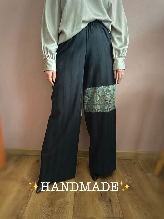 Szerokie, bawełniane spodnie z koronką