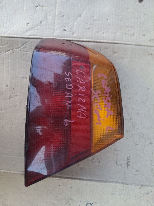 Фонарь / стоп / задній ліхтар Mitsubishi Carisma седан