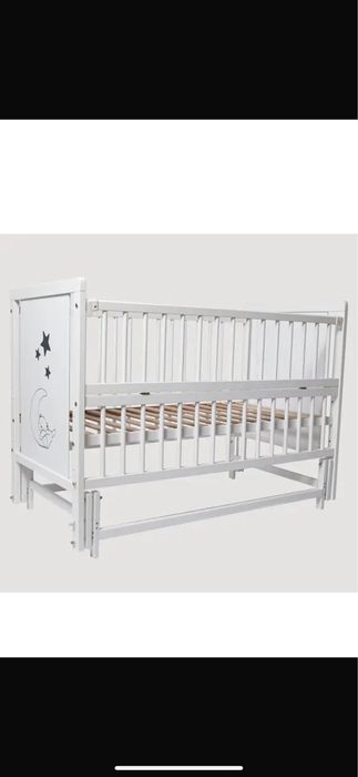 Продам дитяче ліжечко з маятниковим механізмом.