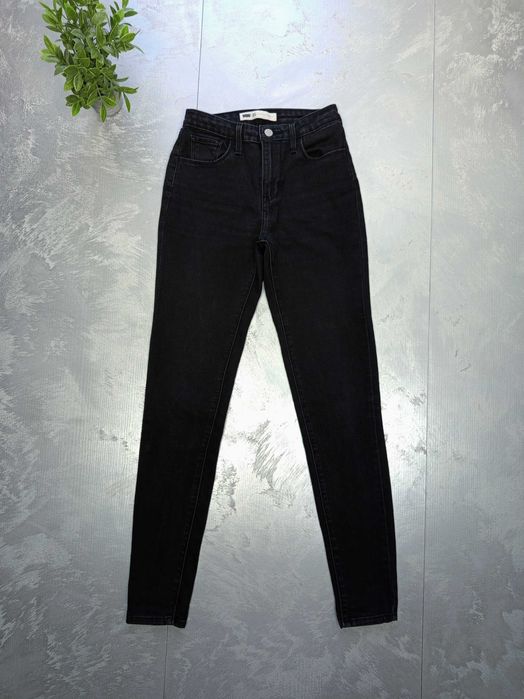 Damskie spodnie Levis W25 L30 XS