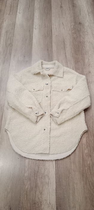 Bluza damska zapinana.