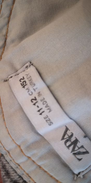 Calças jardineira ganga 11/12 anos