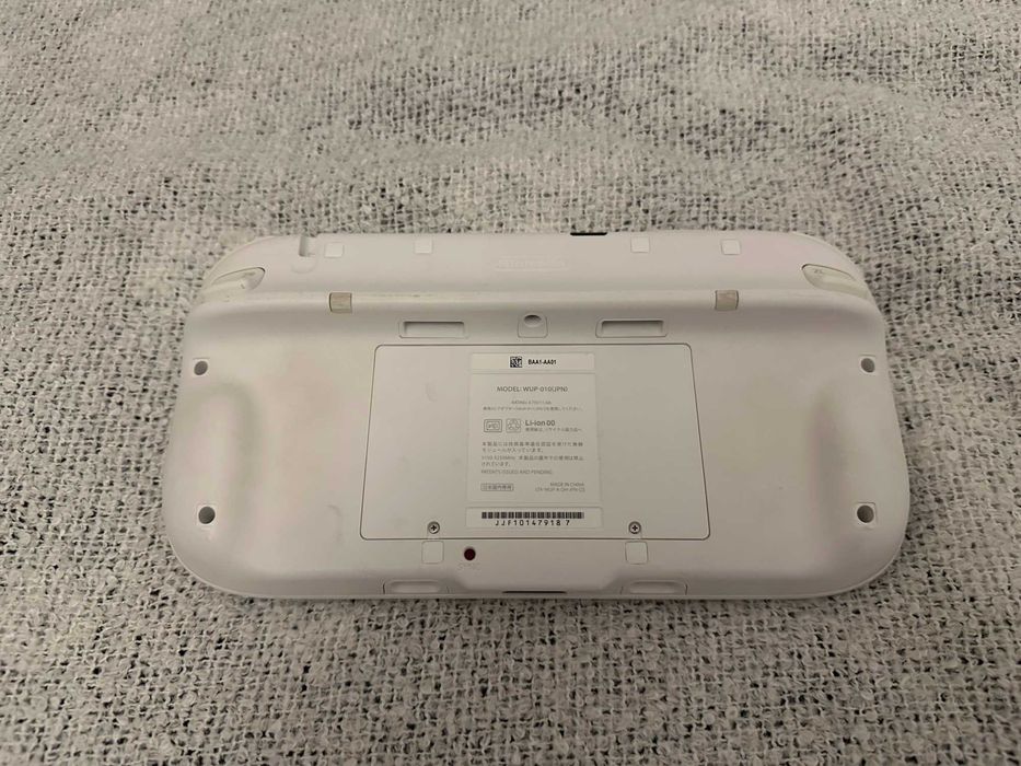 Nintendo Wii U + Nintendo Wii U Pad