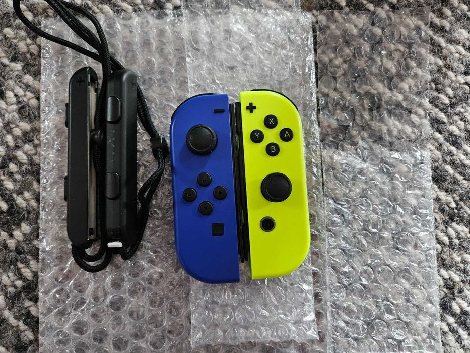 Nintendo Joycon granatowy + żółty stan bdb