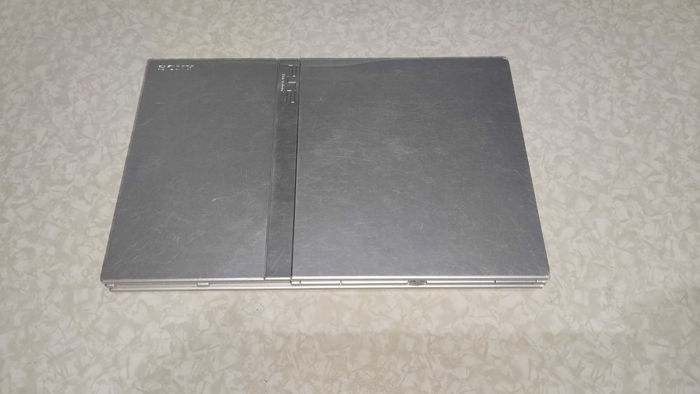Consola PS2 Slim Prateada com lente nova + Cabo Flat Novo