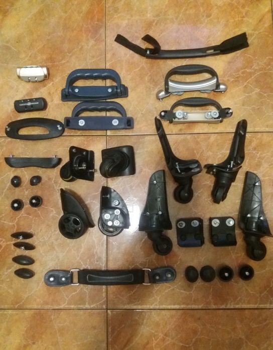 Колеса и запчасти к чемодану.