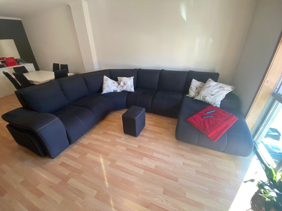 Sofá de canto com 3 pufs