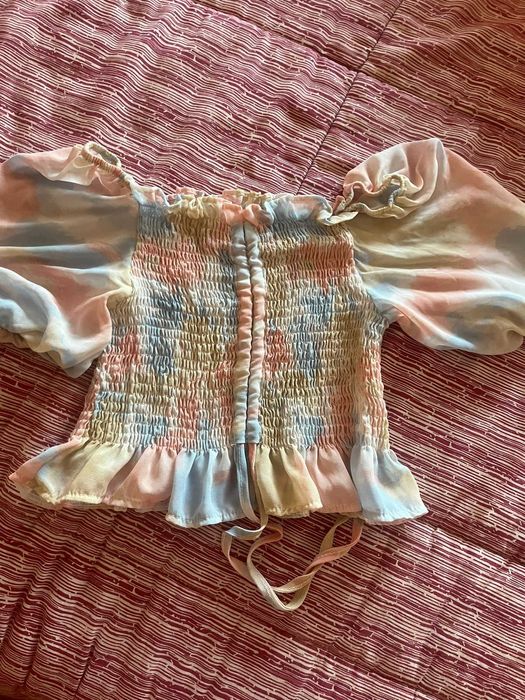 Top floral transparente