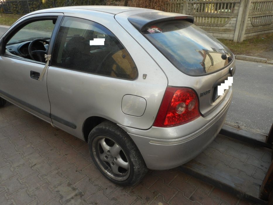 Rover 200,kolor srebrny,3 drzwi,1,4 benzyna 16V,skory,na czesci