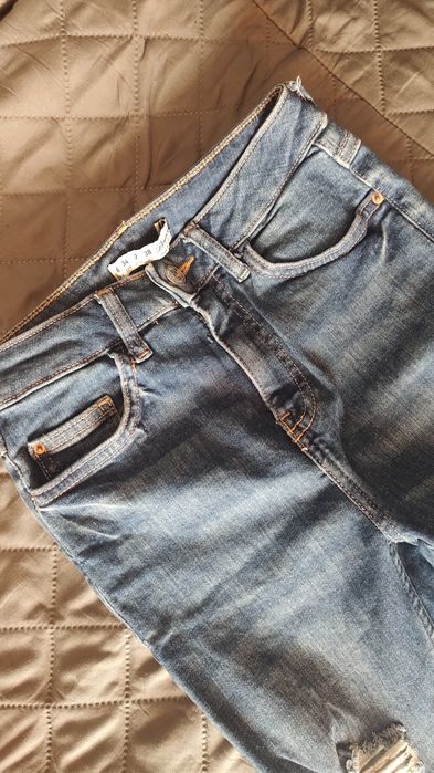 Spodnie z przetarciem DenimCo XS