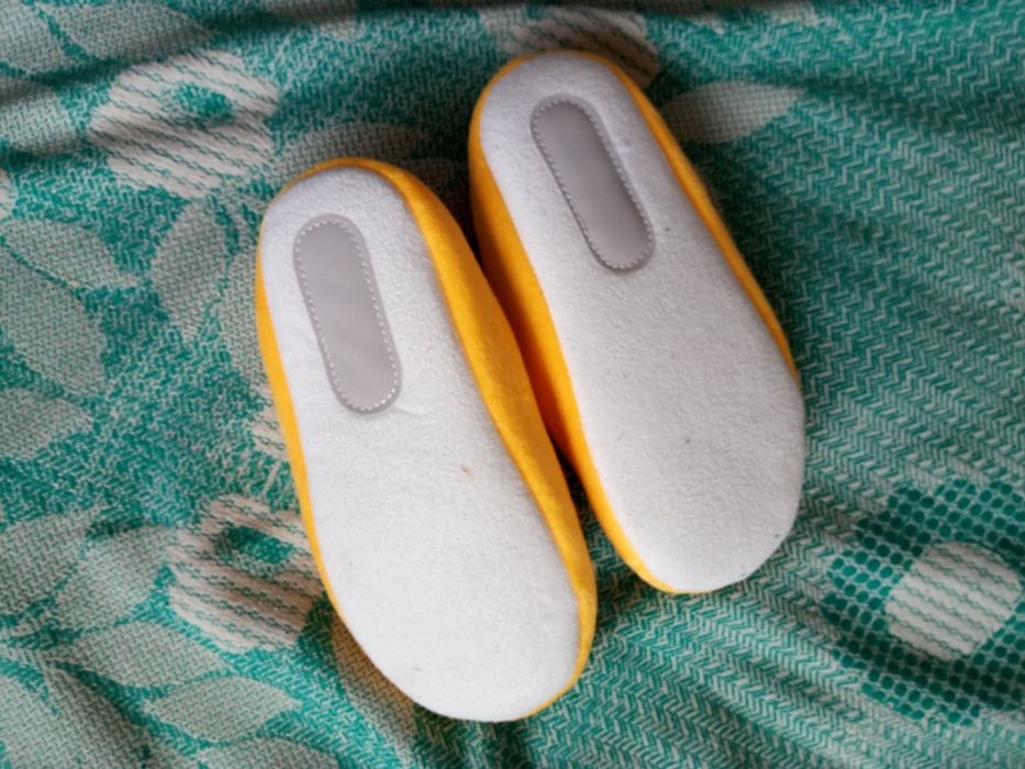 Нові дитячі тапочки