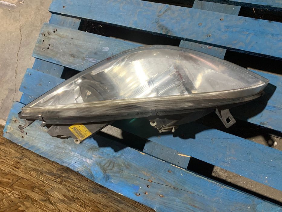 Farol Esquerdo Mitsubishi Colt