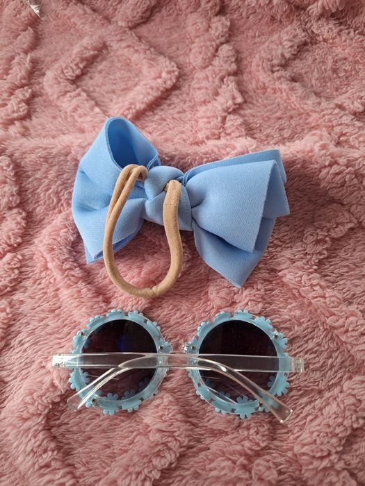 Nowe niebieskie dziecięce okulary przeciwsłoneczne dla dziecka dziewcz