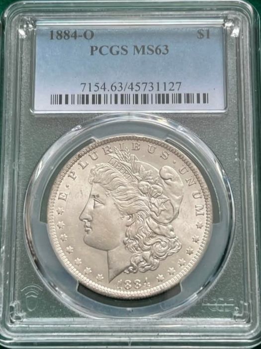 Долар 1884 року Моргана,Новий Орлеан в слабі  PCGS MS 63