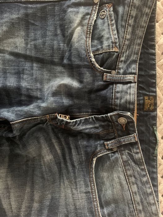 Джинсы мужские