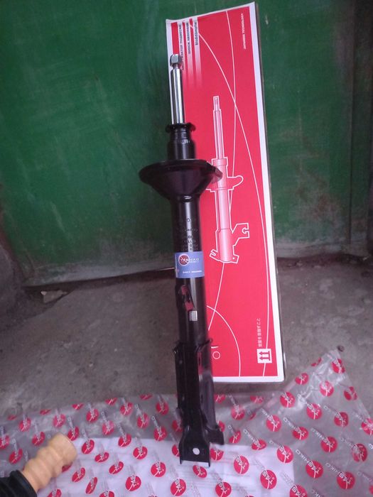 Задние,,передние стойки на мазда 323ВF