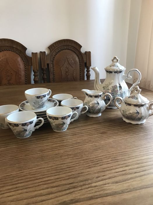 Serviço de café com pavões