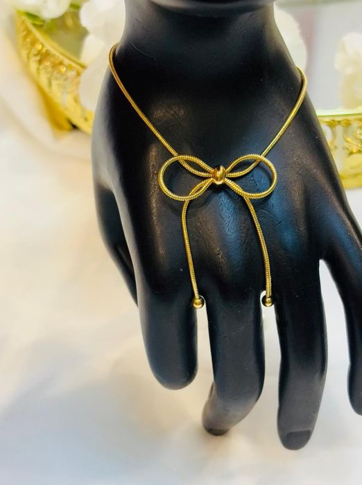 Złota bransoletka kokarda żyłka stal chirurgiczna nierdzewna