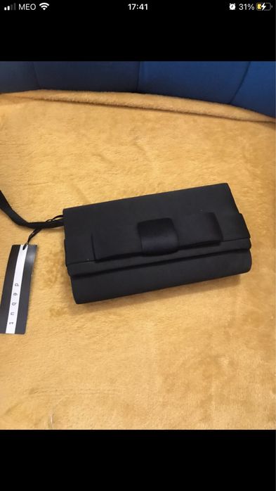 Clutch NOVA preta com laço