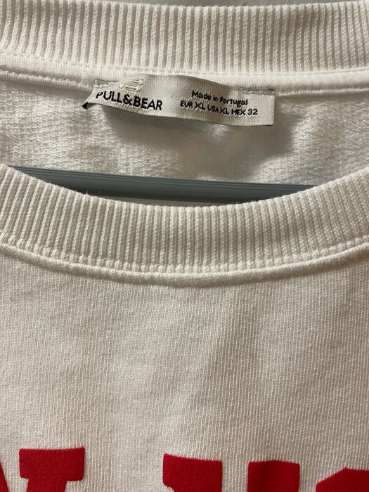 Luźna koszulka biała rozmiar M-XL do pępka