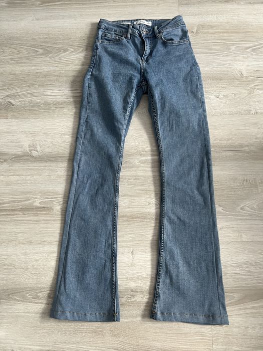 Джинси в кльош жіночі