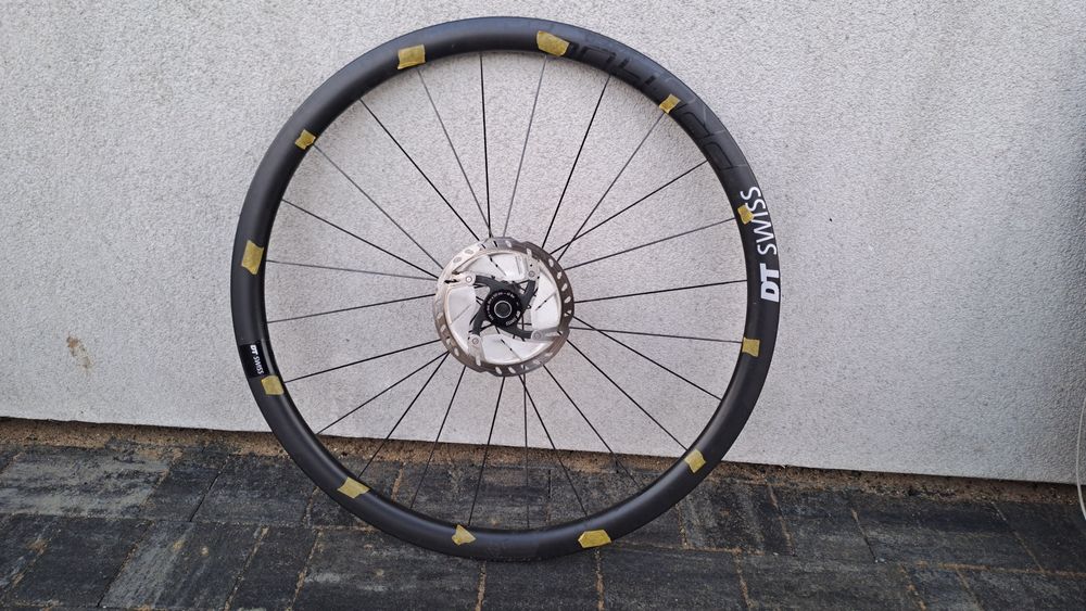 Uszkodzobe koło przednie DT Swiss PRC 1400 Spline