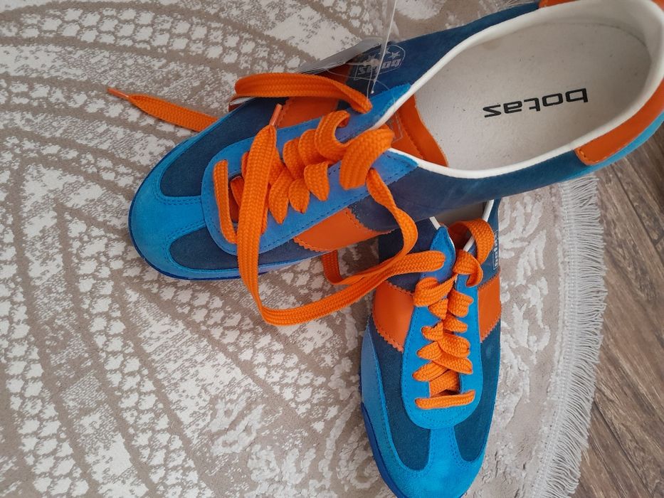 Нові чоловічі кросівки