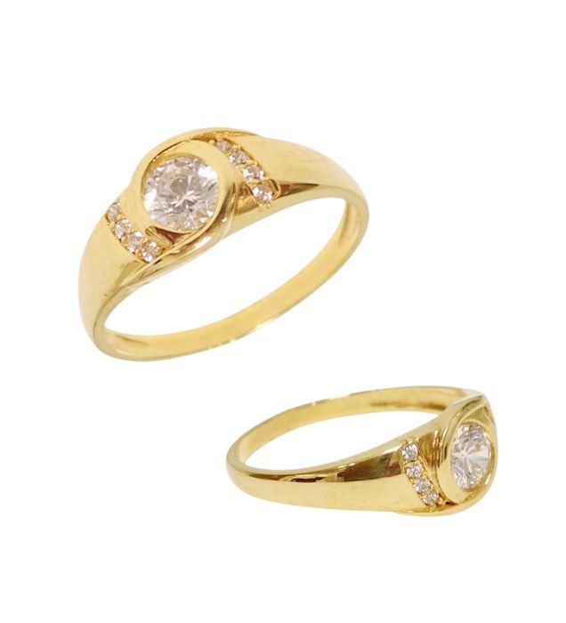 Złoty pierścionek 585 z błyszczącym oczkiem cyrkonią zaręczynowy r 16