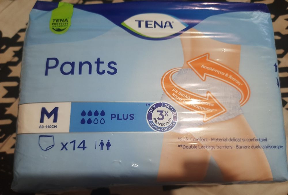 Подгузники - трусики . Tena M