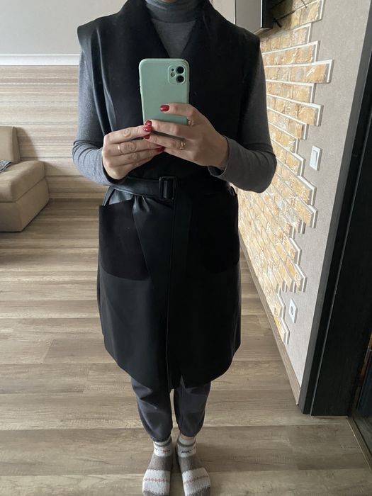 Жіноча жилетка