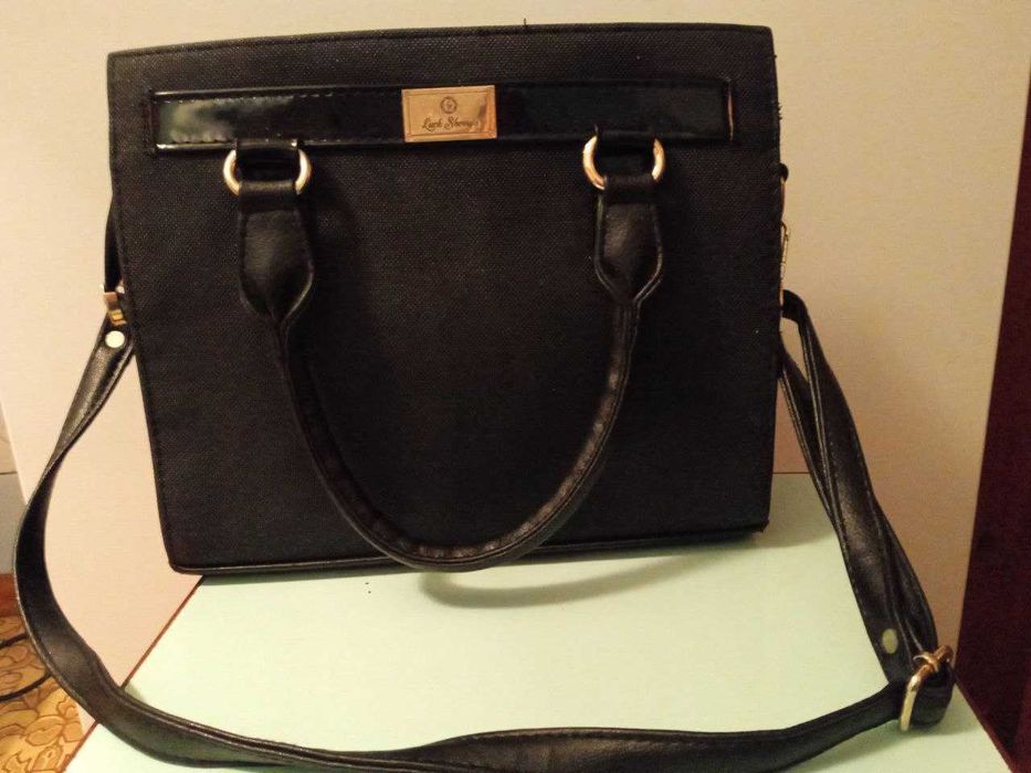 Сумка шкiряна  чорного кольору luck sherrys