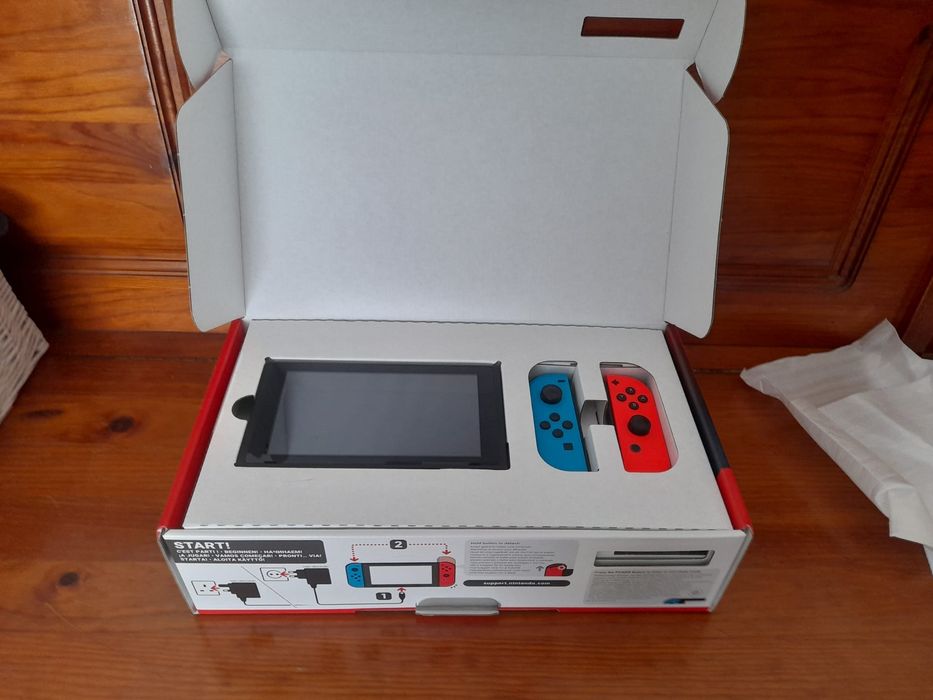 Nintendo com embalagens e caixa. Usada mas está como nova