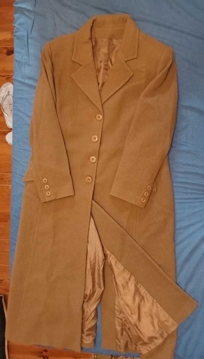 Casaco comprido de fazenda