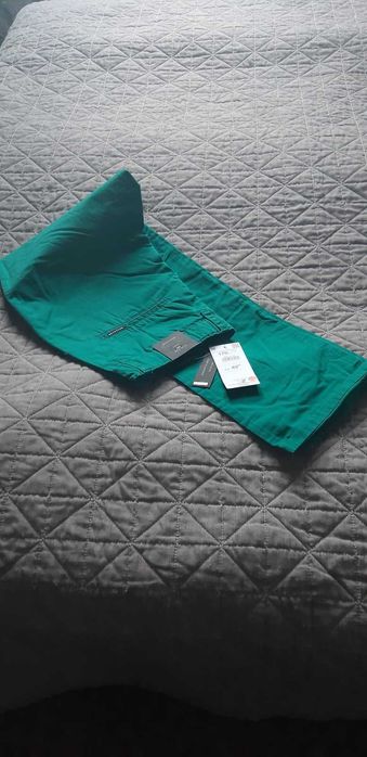 Spodnie młodzieżowe RESERVED na lato zielone nowe rozm.170