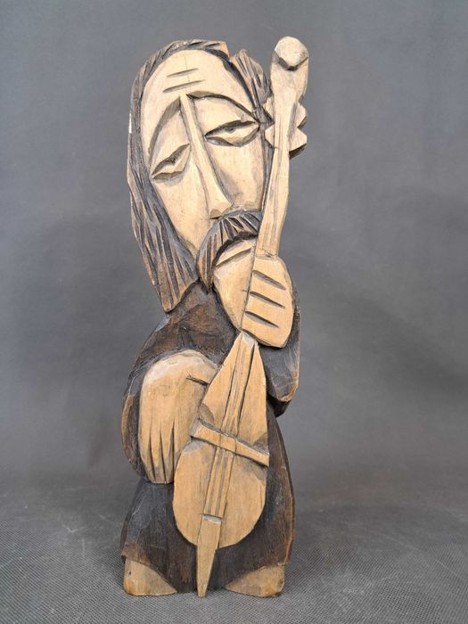 Muzykant, ludowa rzeźba drewniana, wys. 30 cm