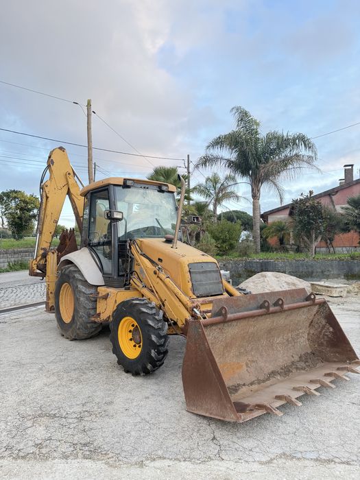 Retroescavadora newholland nh85