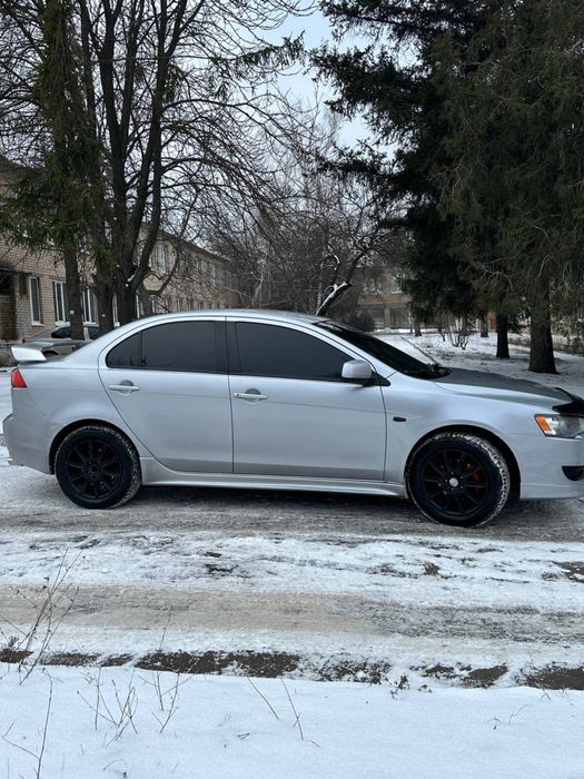 Mitsubishi lancer X автомат кожа на газу