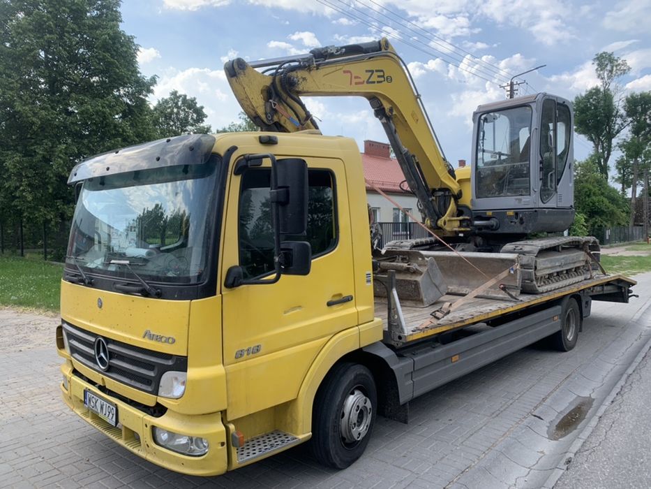Holowanie AutoLaweta Transport Samochodów Ciągników Maszyn RolniczychWypożyczalnia Busów Przyczep Towarowych i Do Koni Pomoc Drogowa Auto Komis