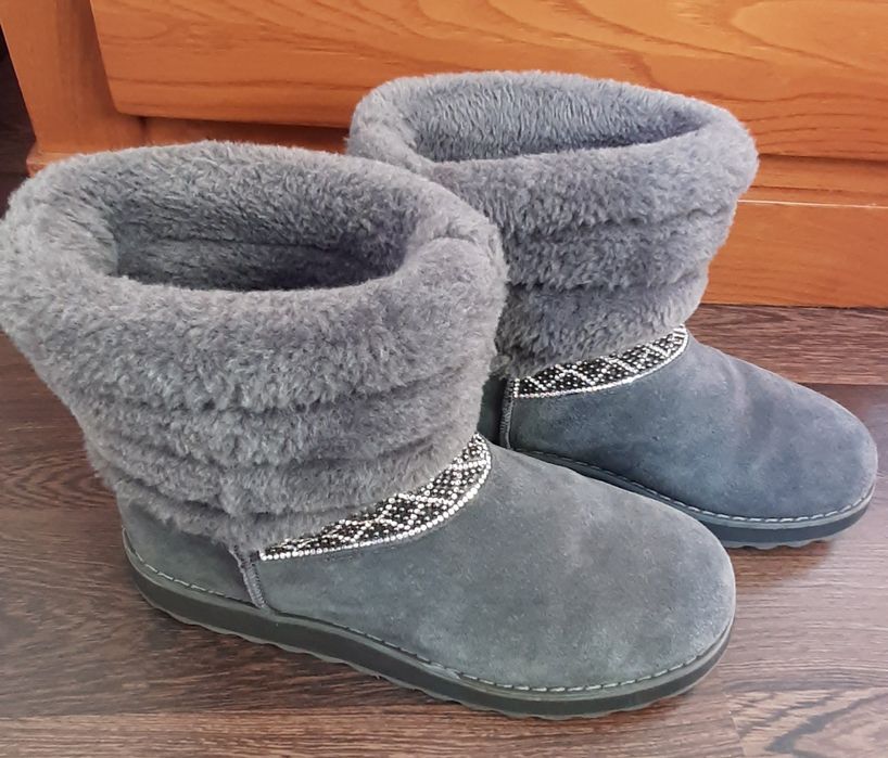 Botas de senhora da Skechers.