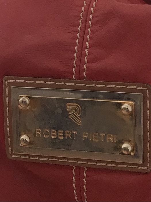 Mala vermelha em pele Robert Pietri
