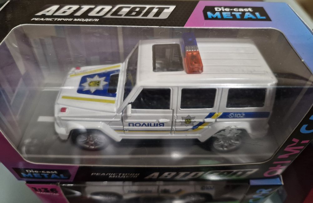 Металева модель Поліція Kinsmart,  Автосвіт, Nissan, пікап
