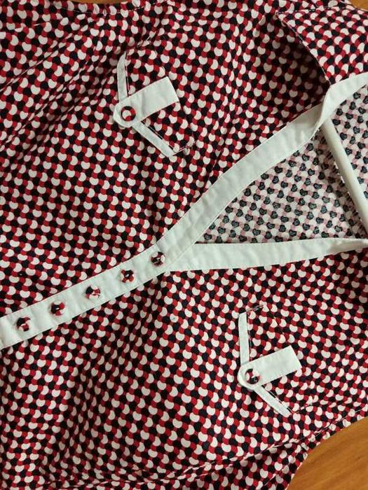 Blusa sem manga com fecho lateral